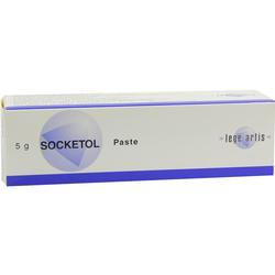 Eine weiße Schachtel mit der Aufschrift "SOCKETOL Paste" in blauer Schrift.
