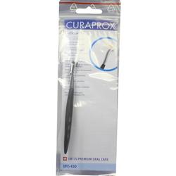 Verpackung mit Zahnpflege-Zubehör der Marke Curaprox.