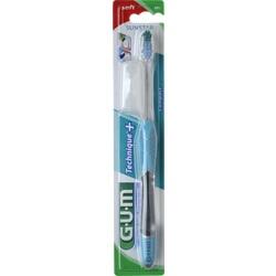 Verpackte Zahnbürste mit blauem Griff in Blisterpackung.